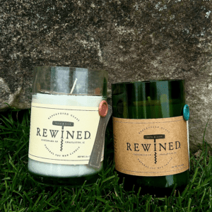Two Rewined Candles with the word rewned on them.