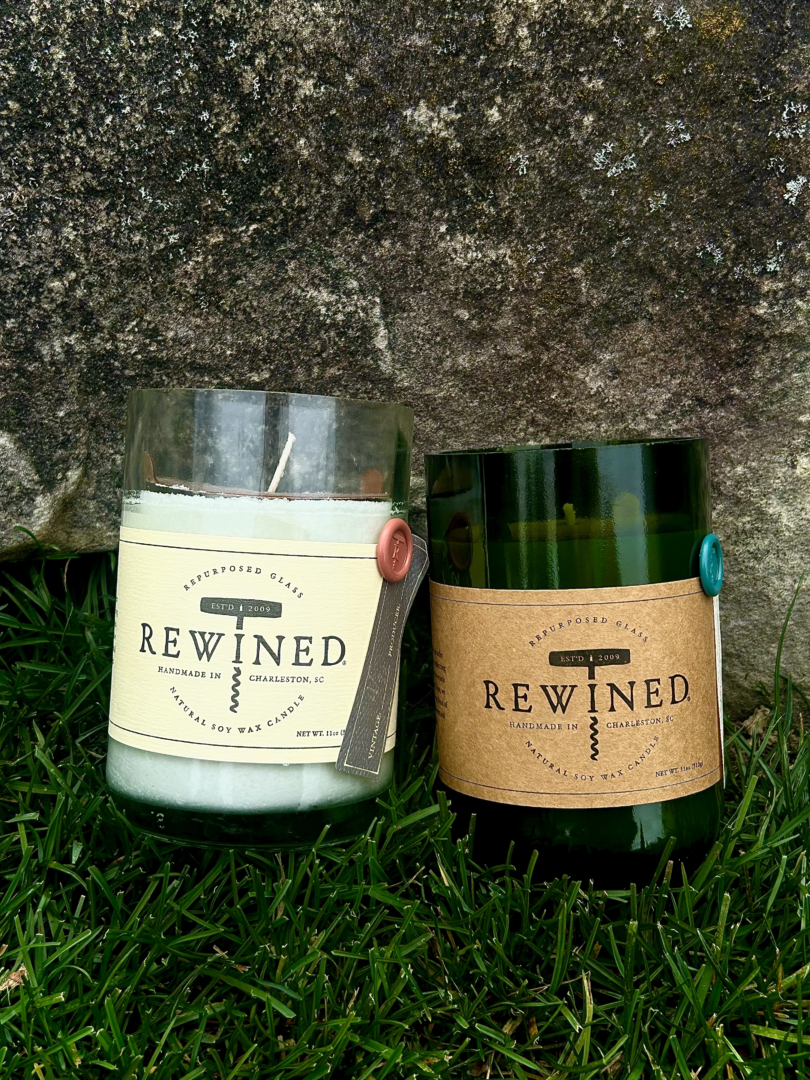 Two Rewined Candles with the word rewned on them.